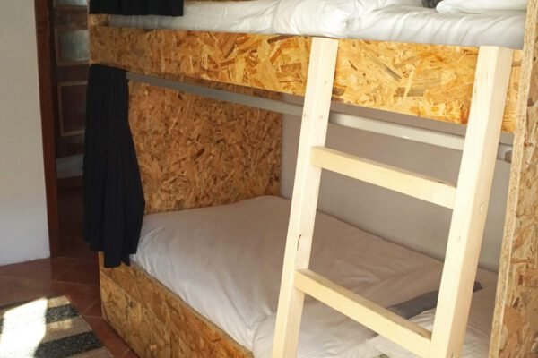 Bunk bed room with sun shining